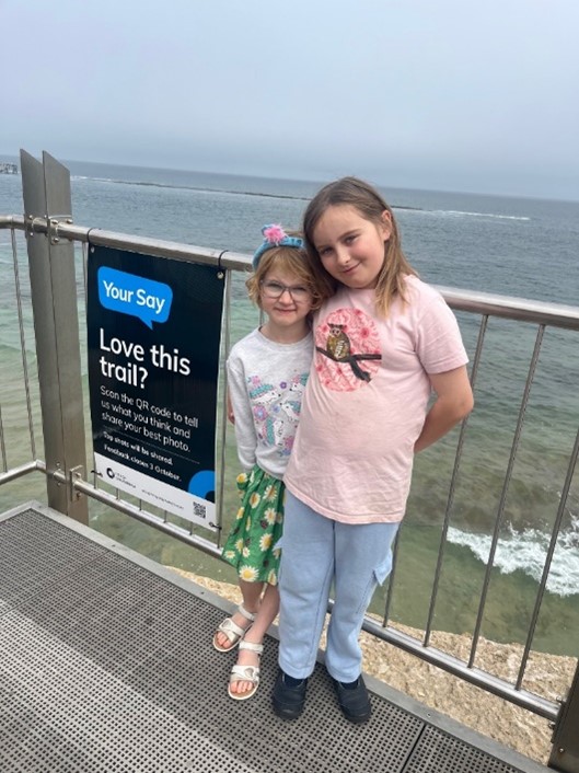 Image of children in front of Your Say sign