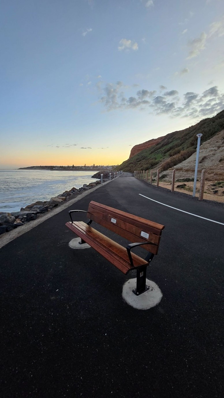 Image of trail, seat winding around cliff