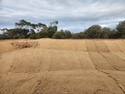 Detention basin with jute matting installed.