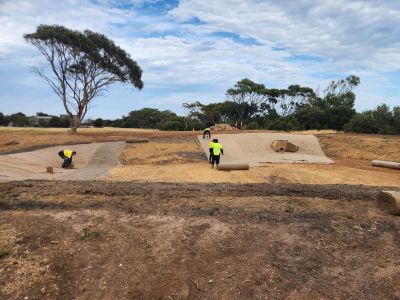 Workers installing the jute matting.